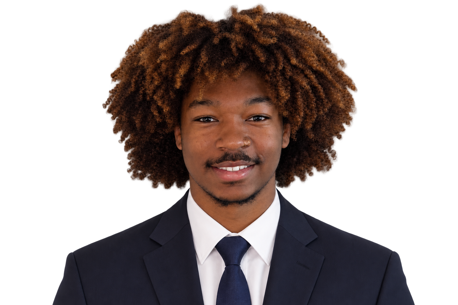 Andrew Taylor in a dark suit and tie